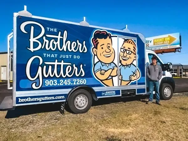 The Brothers That Just Do Gutters franchise truck with professional branding and gutter installation equipment